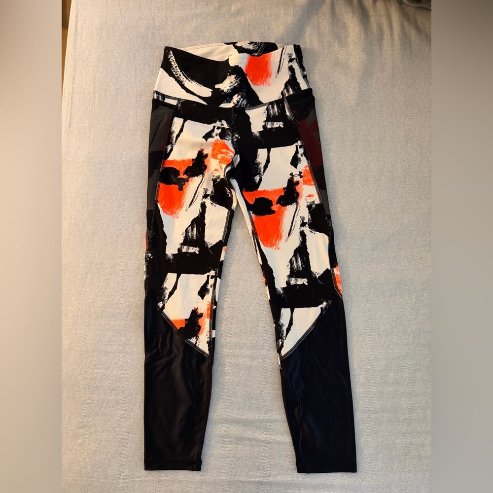 Under Armour leggings. Beautiful color. Only worn one time. Small size.